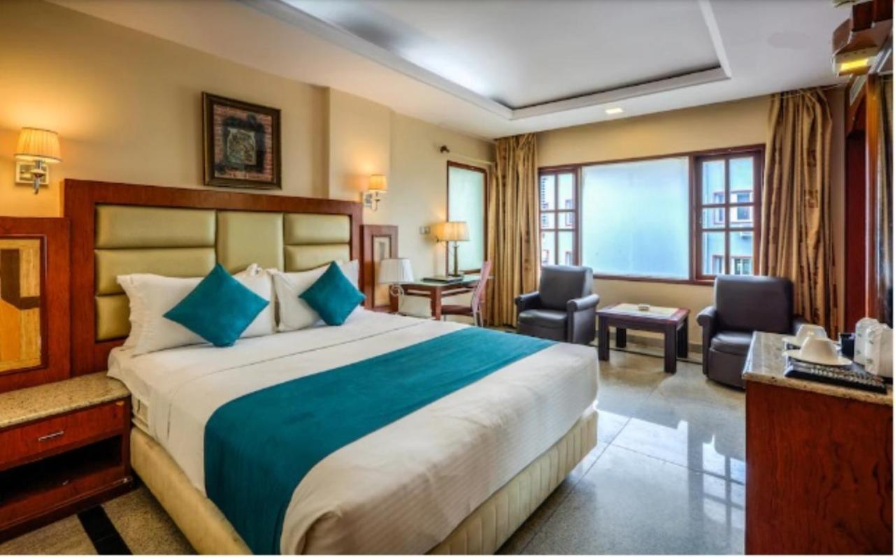 Golden Metro Hotel Bangalore Bagian luar foto