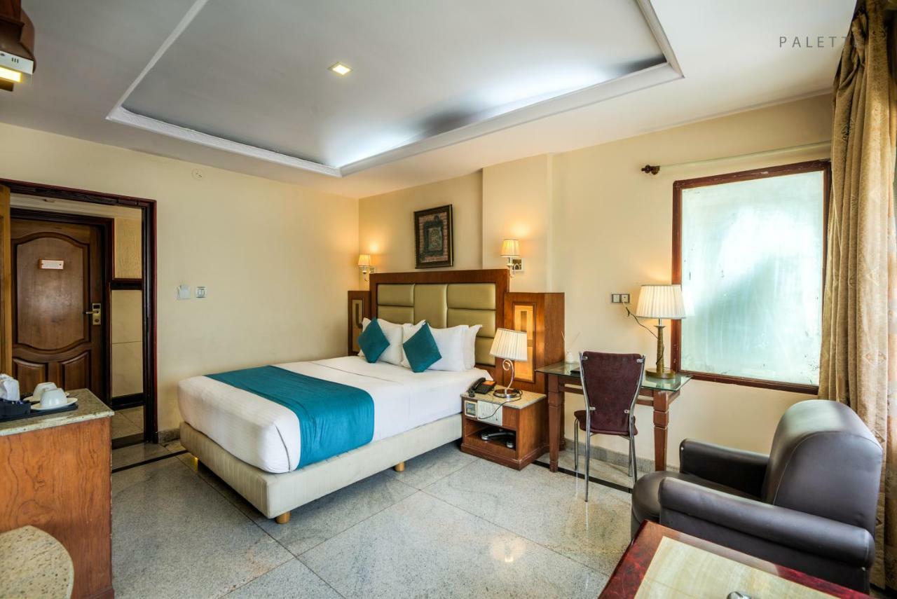 Golden Metro Hotel Bangalore Bagian luar foto