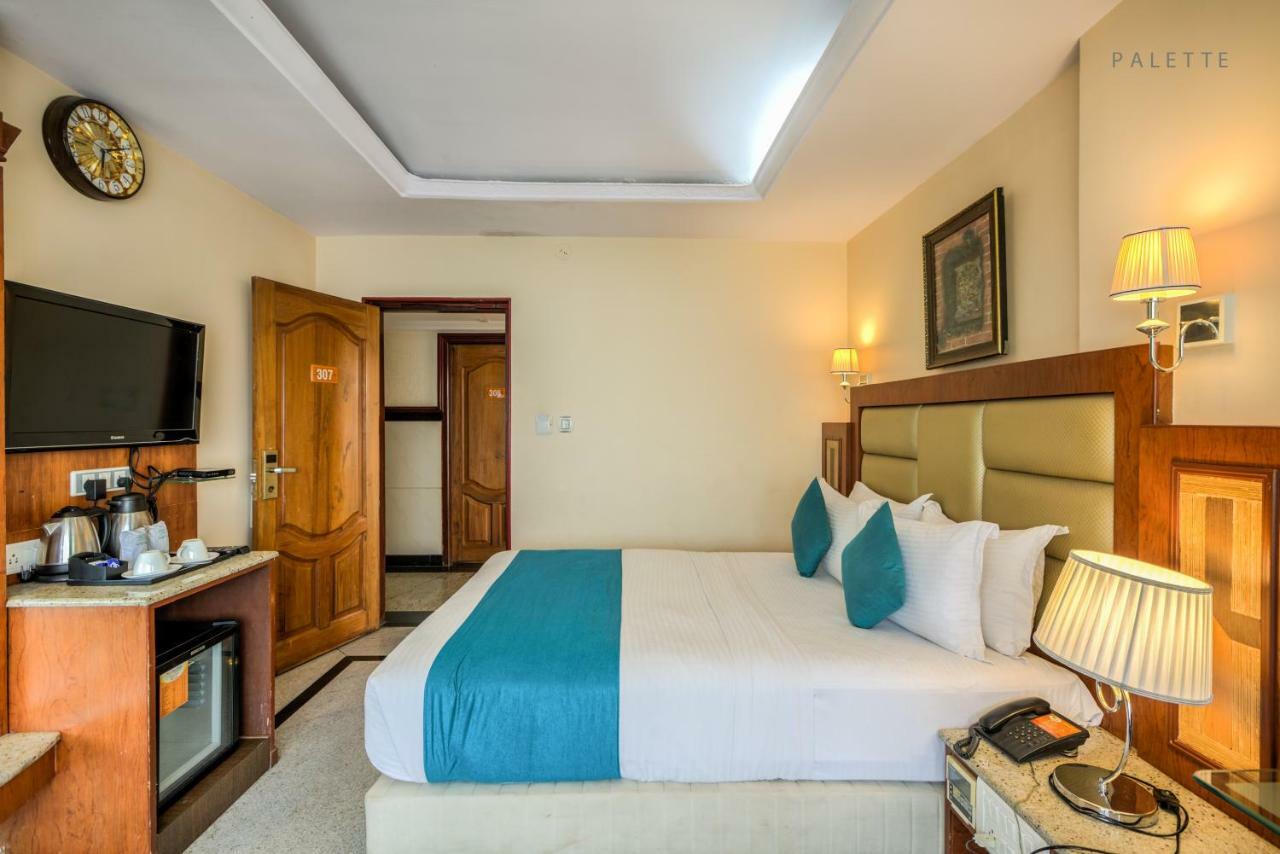 Golden Metro Hotel Bangalore Bagian luar foto