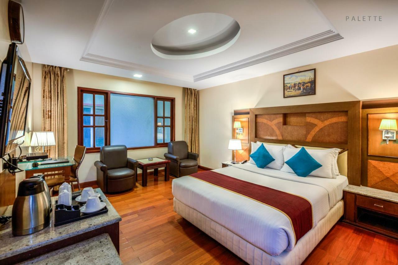 Golden Metro Hotel Bangalore Bagian luar foto